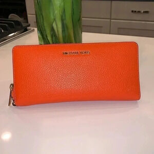 Michael Kors Jet Set Travel wallet Poppy orange color NWT gorgeous wallet